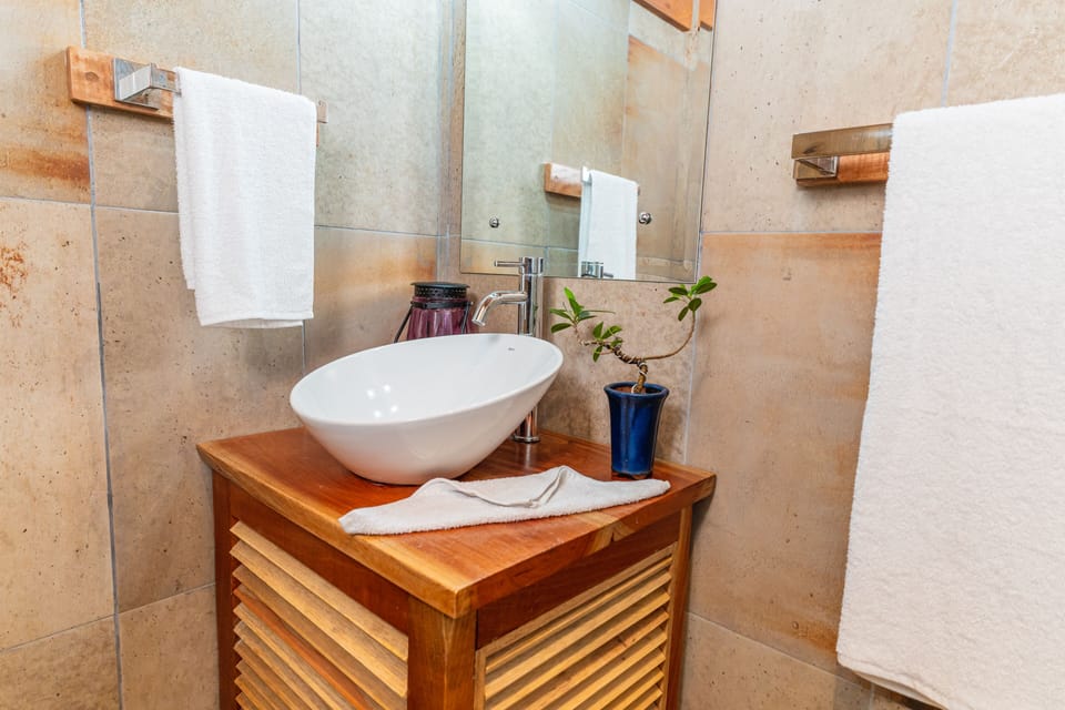 Family Quadruple Room | Bathroom | Shower, rainfall showerhead, towels, soap