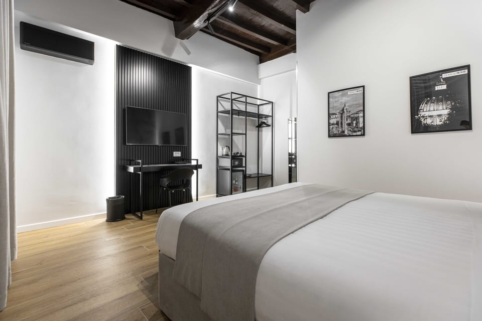 Premium bedding, down comforters, pillowtop beds, free minibar
