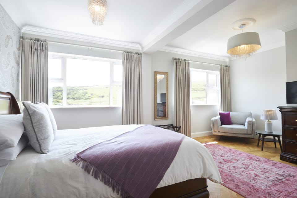 Premium bedding, pillowtop beds, desk, blackout drapes