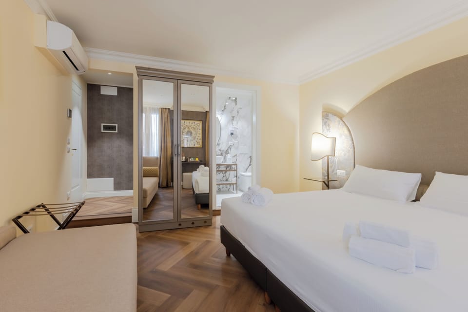 Egyptian cotton sheets, premium bedding, minibar, in-room safe