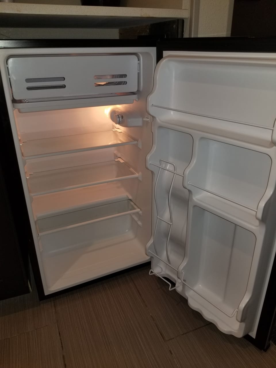 Desk, laptop workspace, blackout drapes, iron/ironing board