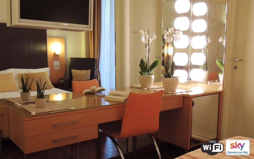 Suite, Connecting Rooms | Minibar, in-room safe, soundproofing, iron/ironing board