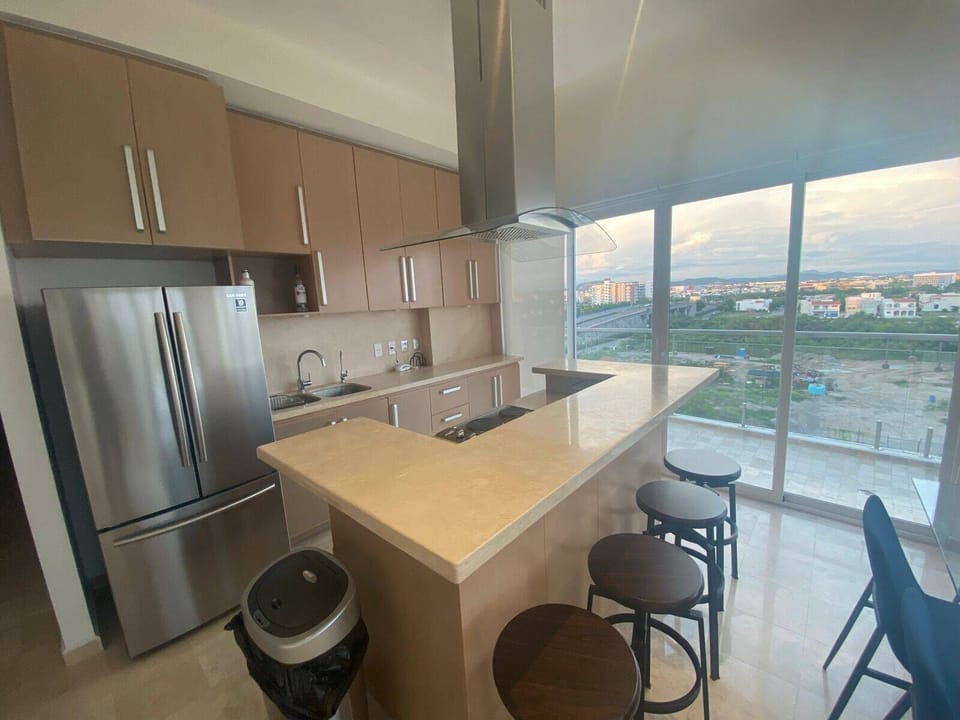 Family Condo | Private kitchen | Cookware/dishes/utensils, dining tables