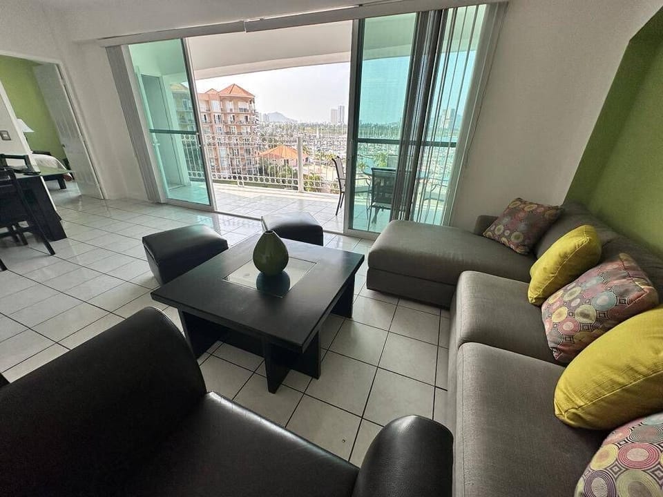 Family Condo | Living area | 35-inch TV with cable channels