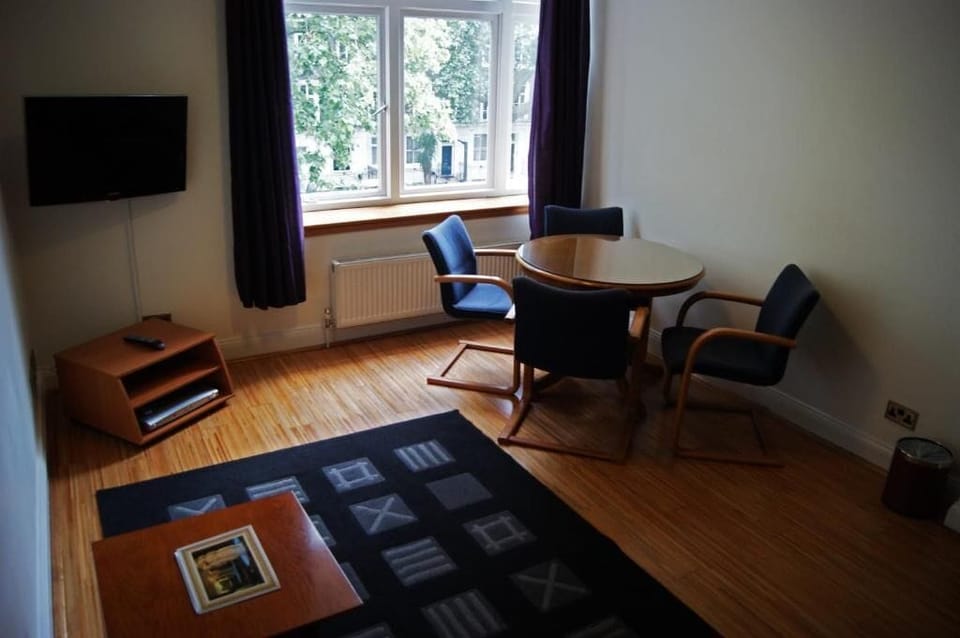 Family Apartment | Living area | Flat-screen TV