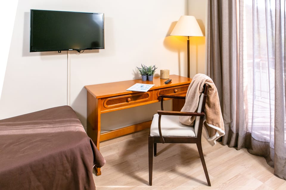 Desk, free WiFi, bed sheets