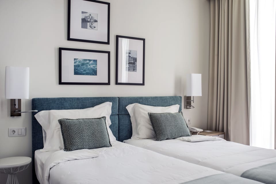 Standard Double Room | Minibar, in-room safe, blackout drapes, cribs/infant beds