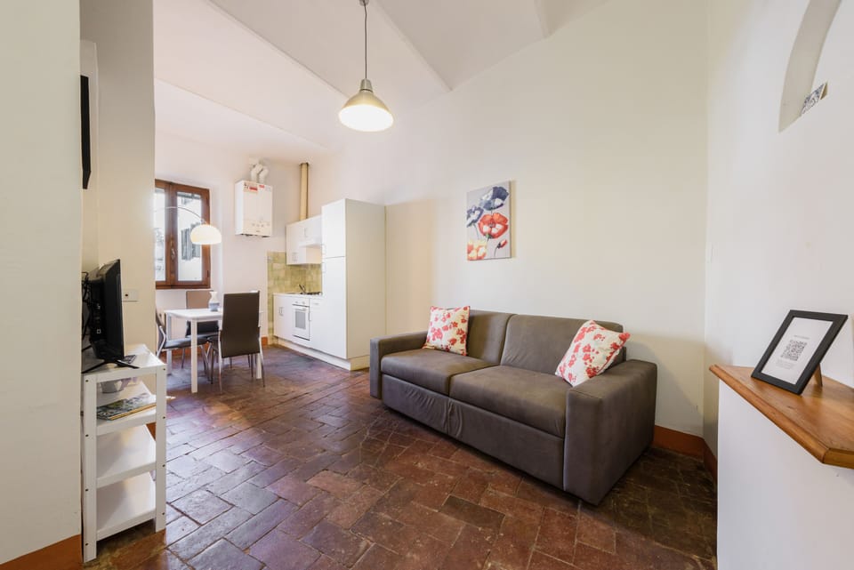 Comfort Apartment | Living area | 32-inch flat-screen TV with digital channels, TV