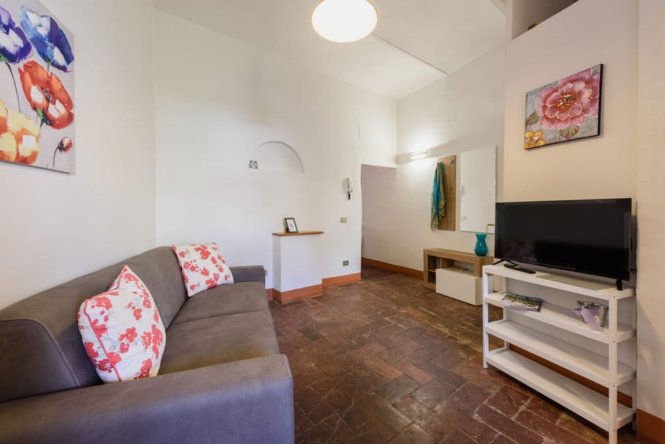 Comfort Apartment | Living area | 32-inch flat-screen TV with digital channels, TV
