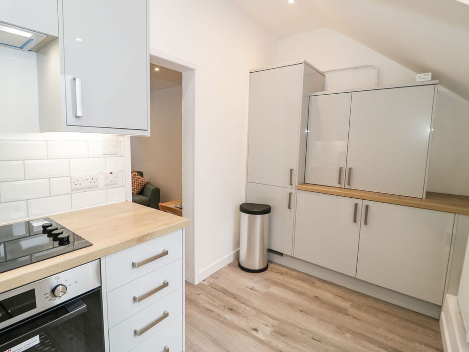 Fridge, electric kettle, toaster, cookware/dishes/utensils