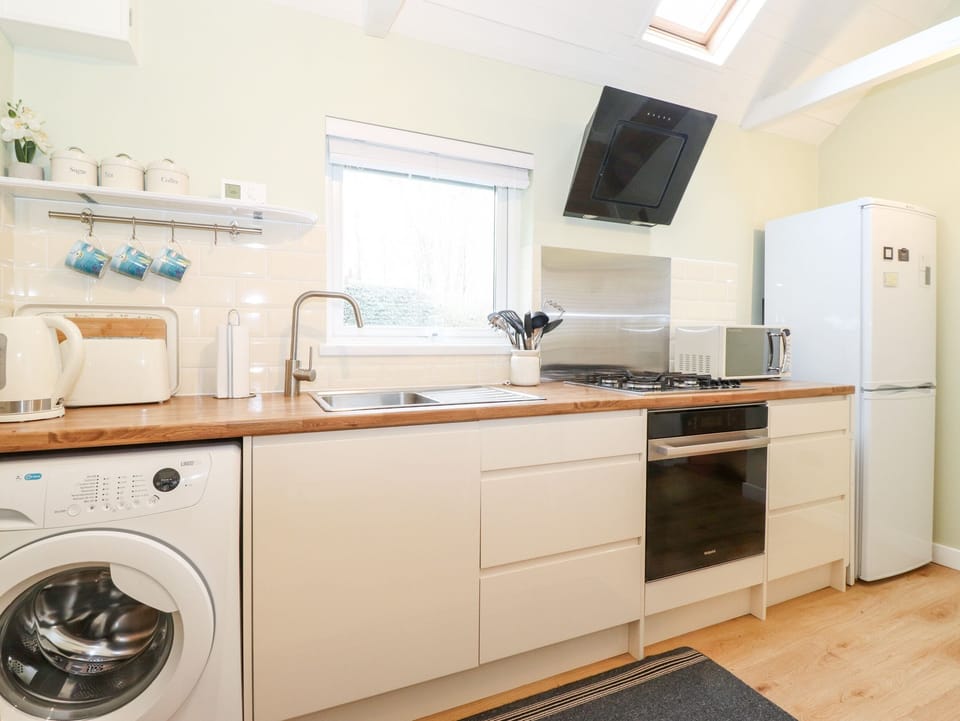 Fridge, electric kettle, toaster, cookware/dishes/utensils