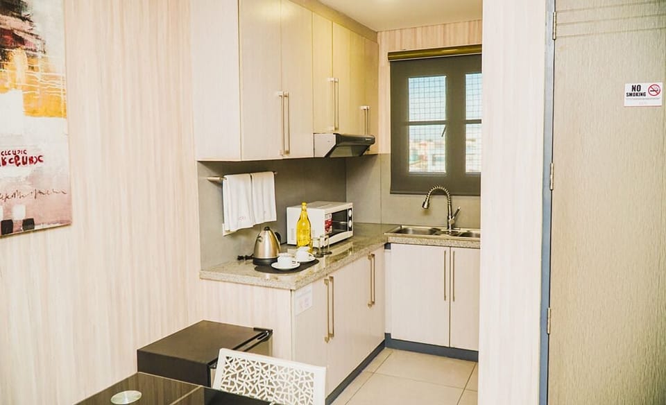 Executive Suite, 1 Bedroom | Individually furnished, desk, iron/ironing board, free WiFi