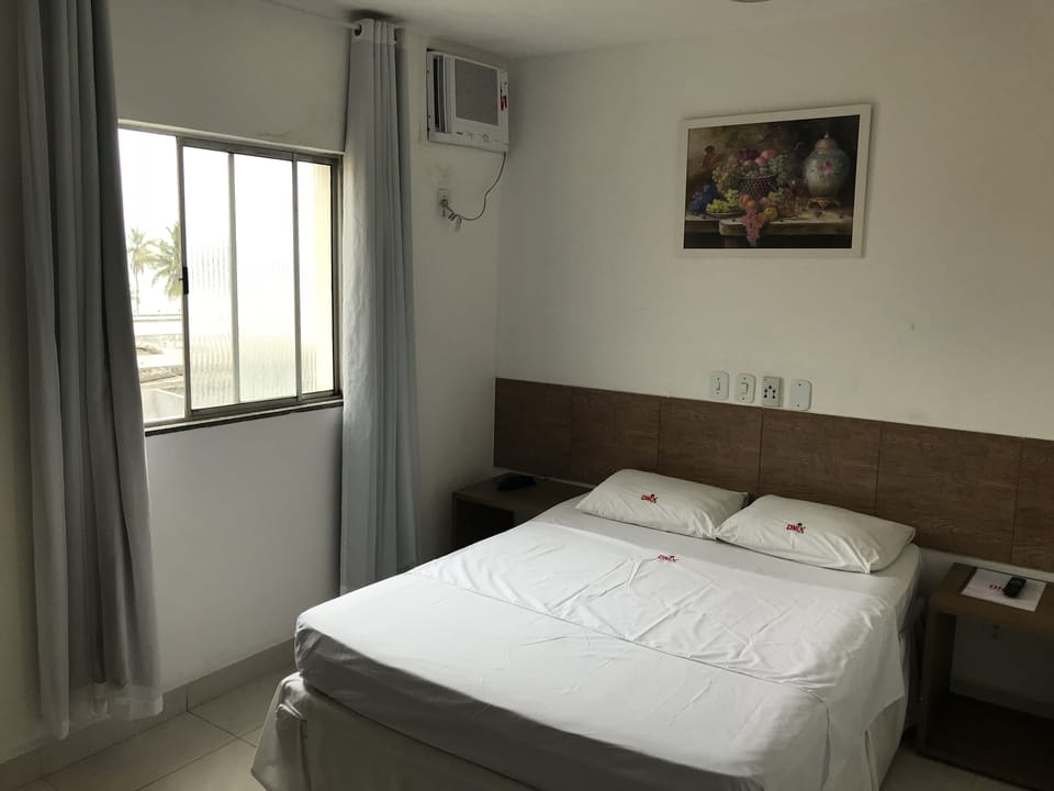Minibar, desk, blackout drapes, iron/ironing board