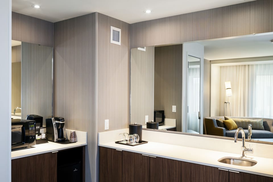 Suite, 1 Bedroom | In-room safe, desk, laptop workspace, iron/ironing board