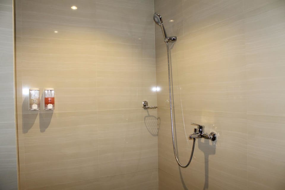 Shower, free toiletries, slippers, towels