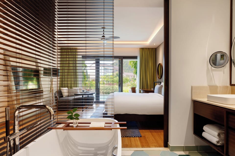 Premium Room, 1 King Bed, Pool Access (Plunge pool access) | Bathroom | Separate tub and shower, deep soaking tub, free toiletries, hair dryer