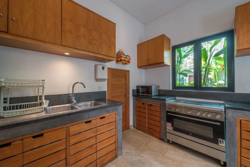 Luxury Villa | Private kitchen | Full-size fridge, oven, stovetop, espresso maker