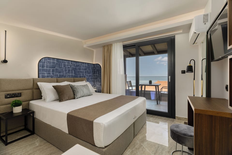 Deluxe Studio Suite, Sea View | In-room safe, individually furnished, desk, blackout drapes