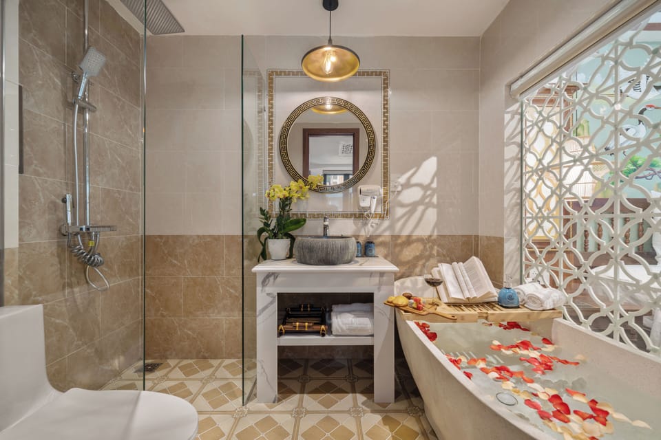 Executive Triple Room, Bathtub, Balcony with Riverside View | Bathroom | Separate tub and shower, deep soaking tub, hydromassage showerhead