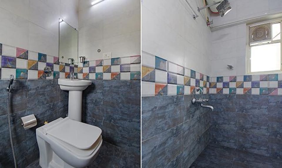 Deluxe Room | Bathroom | Shower, rainfall showerhead, free toiletries, towels