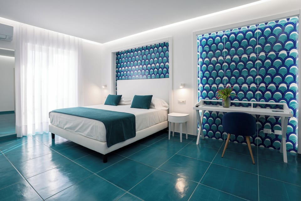 Superior Triple Room | Minibar, in-room safe, individually decorated, individually furnished