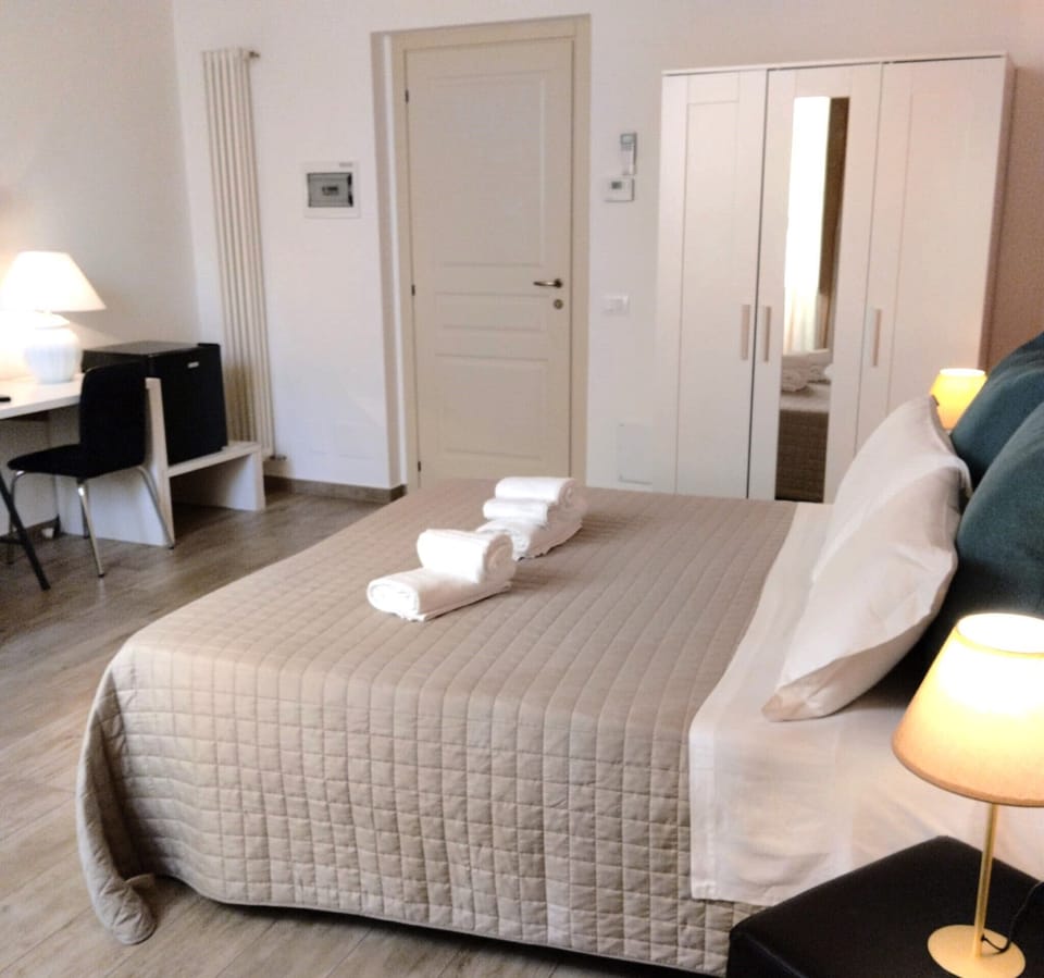 Triple Room | Down comforters, in-room safe, iron/ironing board (on request)