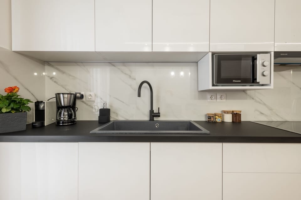 Exclusive Apartment | Private kitchen | Espresso maker, coffee/tea maker, electric kettle, dining table