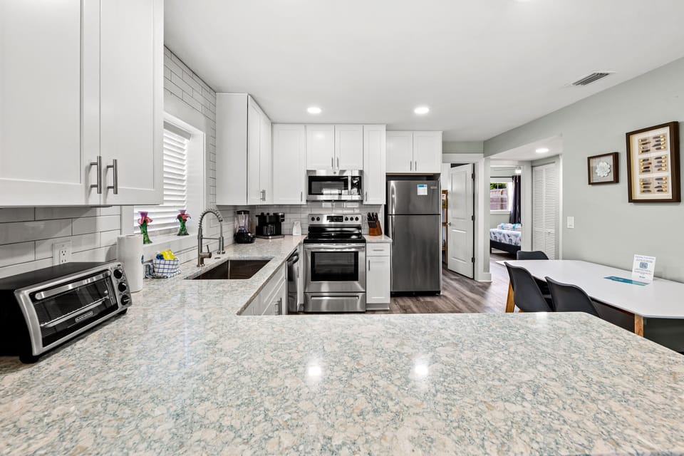 Apartment, Multiple Beds, Balcony, Garden View | Private kitchen | Fridge, microwave, oven, stovetop