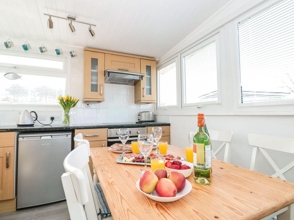 Fridge, electric kettle, toaster, cookware/dishes/utensils
