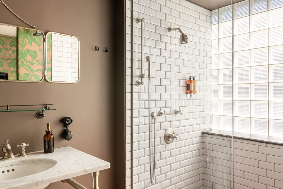 Designer toiletries, hair dryer, bathrobes, slippers