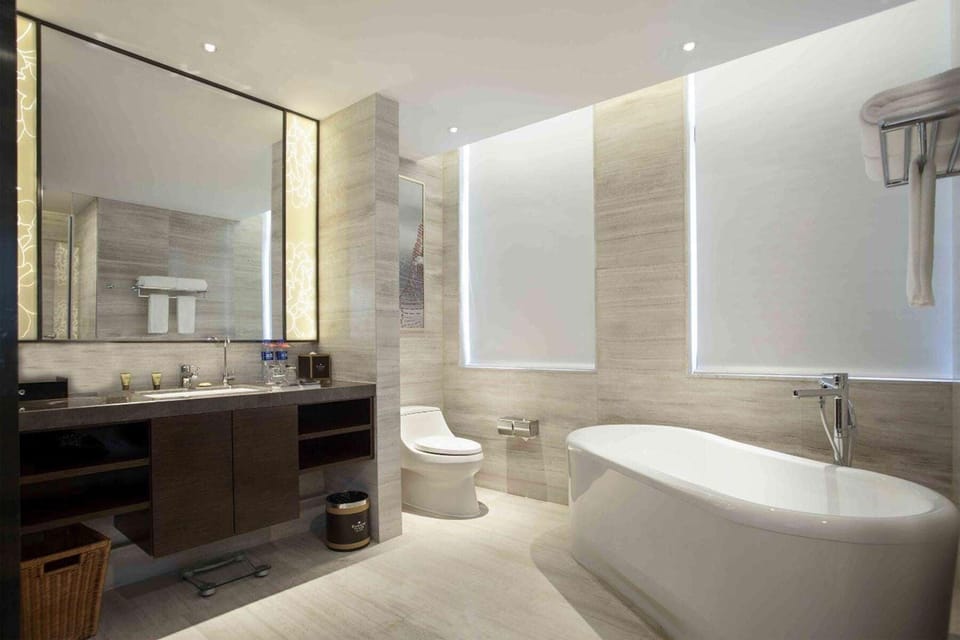 Shower, rainfall showerhead, towels