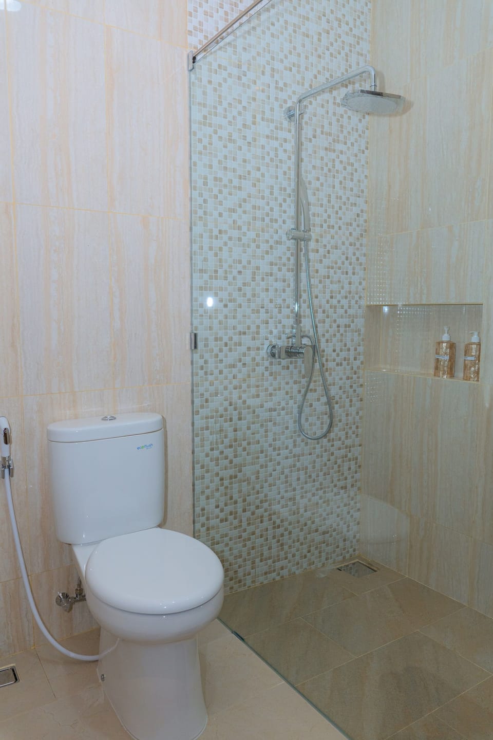 Shower, rainfall showerhead, bidet, towels