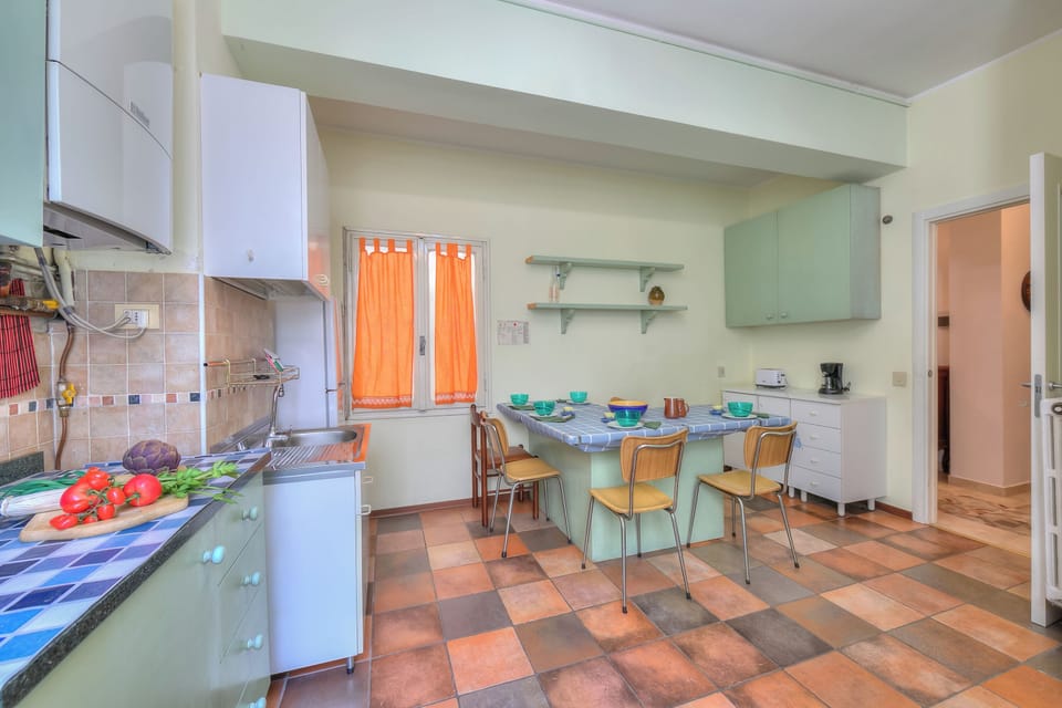 Family Apartment, Multiple Bedrooms, Lakeside (Il Porticciolo Stresa Stunning Lake) | Private kitchen | Fridge, oven, stovetop, coffee/tea maker