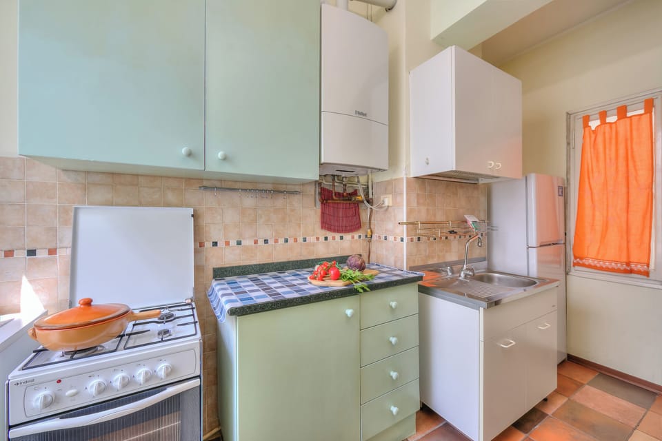 Family Apartment, Multiple Bedrooms, Lakeside (Il Porticciolo Stresa Stunning Lake) | Private kitchen | Fridge, oven, stovetop, coffee/tea maker