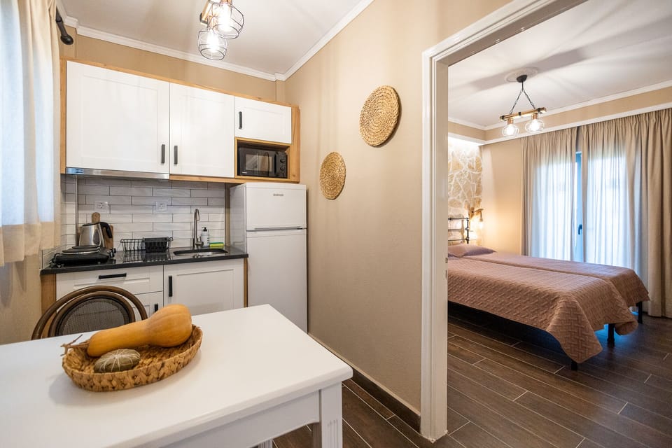 Apartment, 2 Bedrooms | Private kitchenette | Fridge, microwave, stovetop, electric kettle