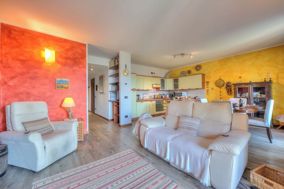 Family House, 3 Bedrooms, 2 Bathrooms (Miralago Lake View & Private Garden) | Living area | TV, stereo