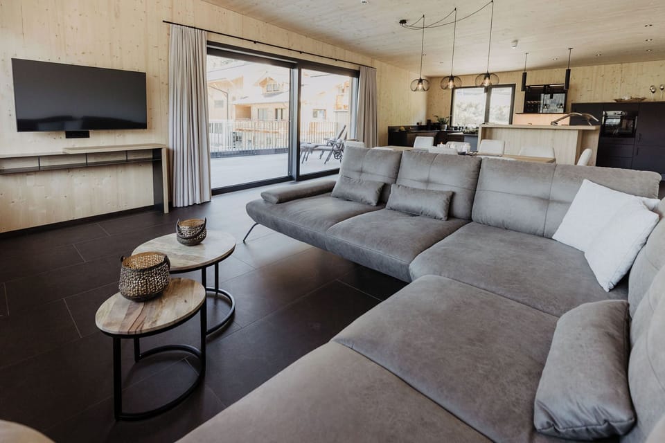 Luxury Penthouse, 4 Bedrooms, Hot Tub, Executive Level (Sauna) | Living room | 50-inch Smart TV with cable channels, TV, heated floors