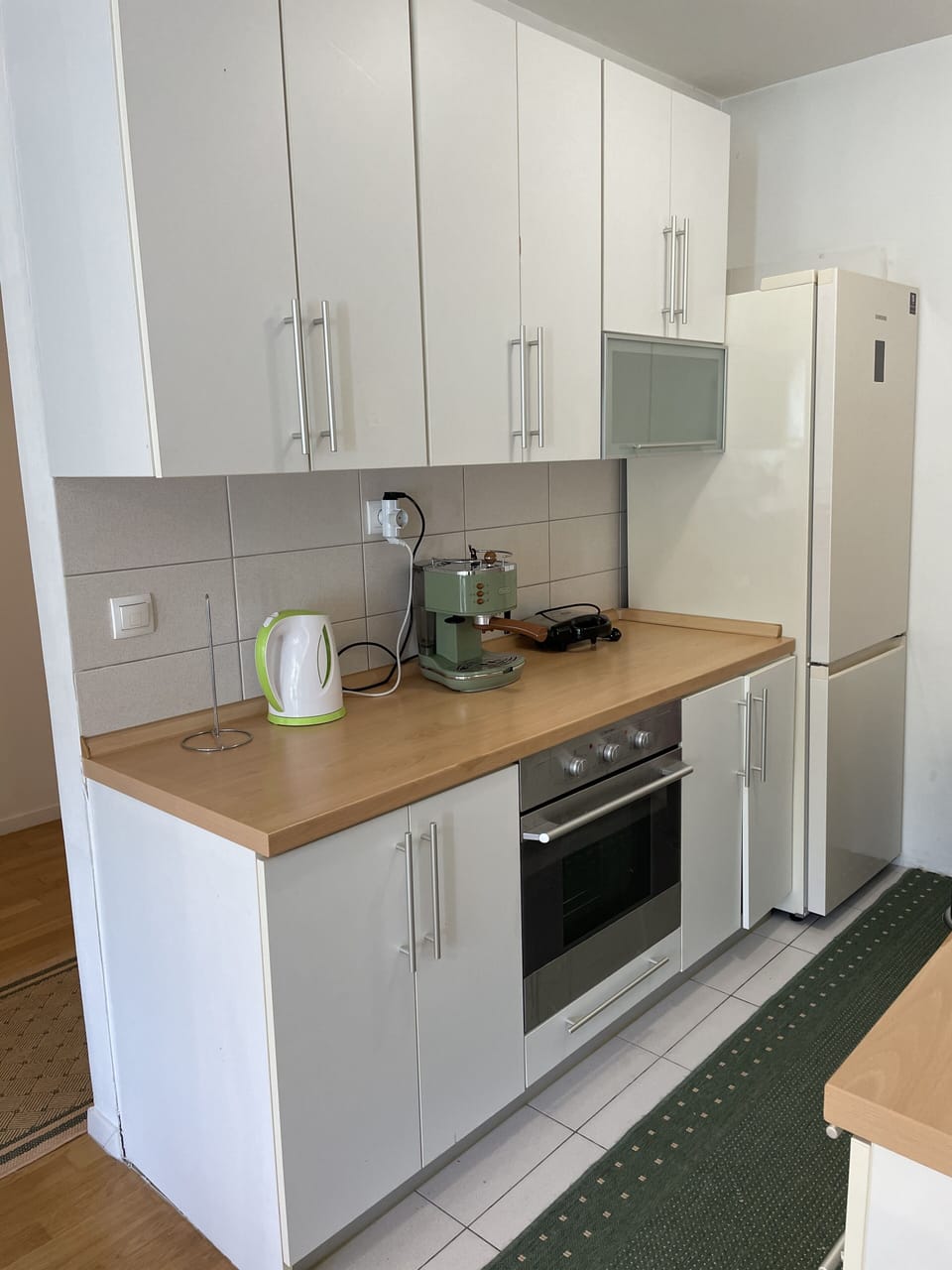Espresso maker, coffee/tea maker, full-size fridge, microwave