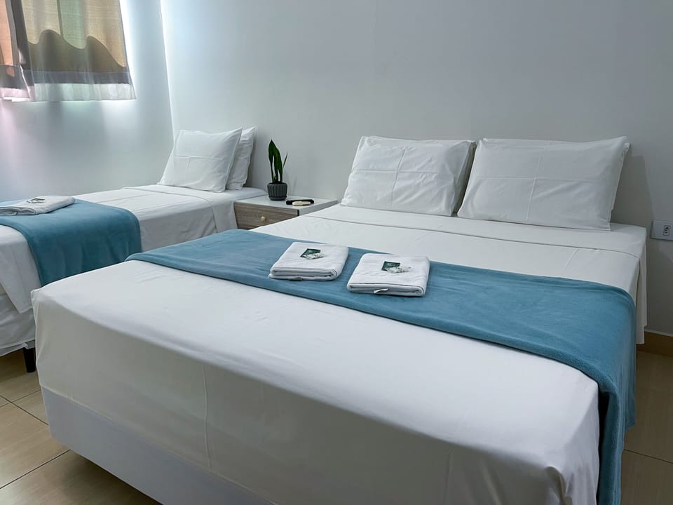 Standard Triple Room | Minibar, iron/ironing board, free WiFi, bed sheets