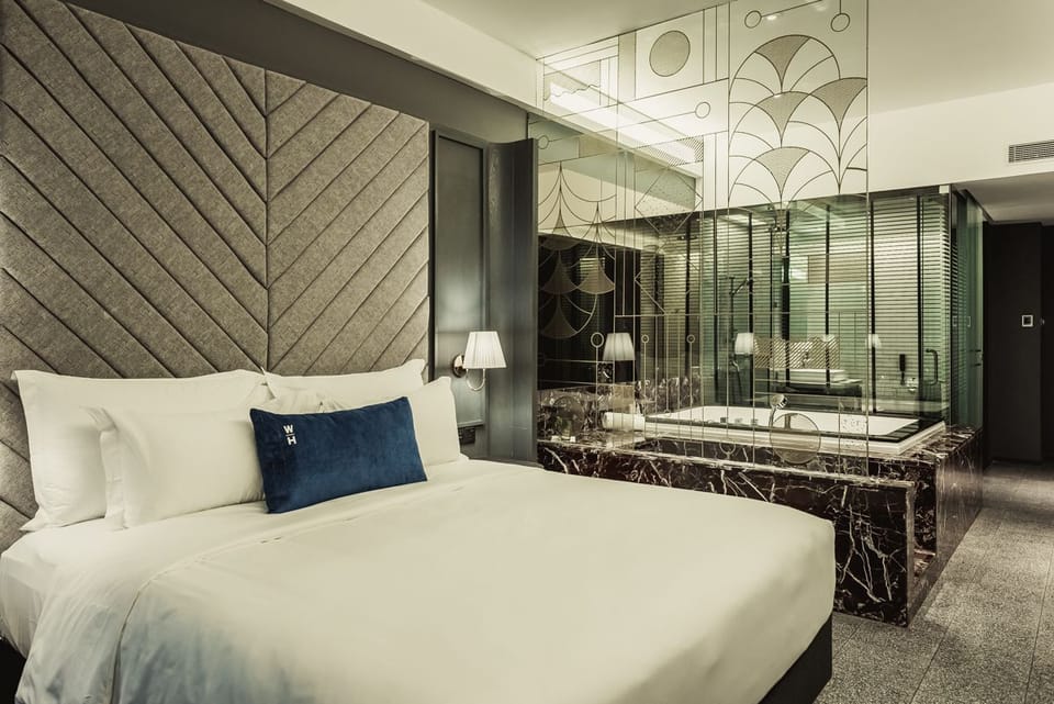 Brewster Studio | Premium bedding, in-room safe, desk, blackout drapes