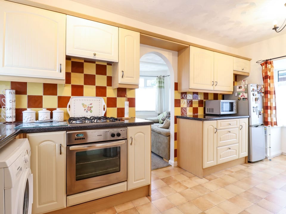 Fridge, electric kettle, toaster, cookware/dishes/utensils