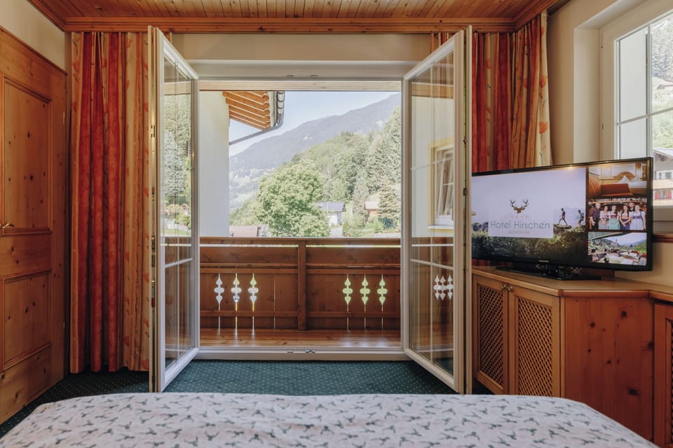 Superior Suite, Balcony, Mountain View | Desk, laptop workspace, soundproofing, iron/ironing board