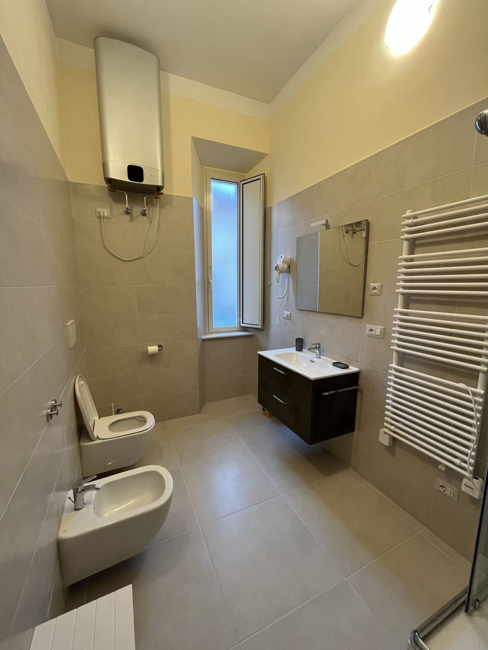 Quadruple Room | Bathroom | Shower, rainfall showerhead, hair dryer, bidet