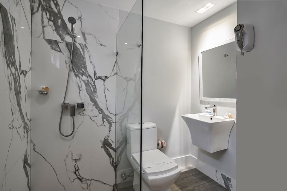 Rainfall showerhead, free toiletries, hair dryer, towels