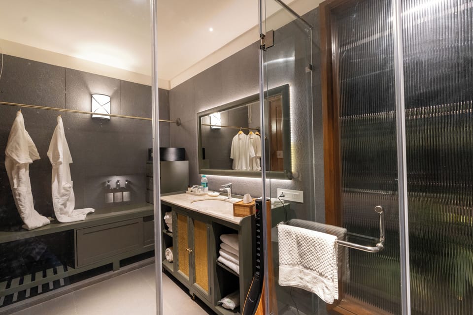 Shower, free toiletries, hair dryer, bathrobes