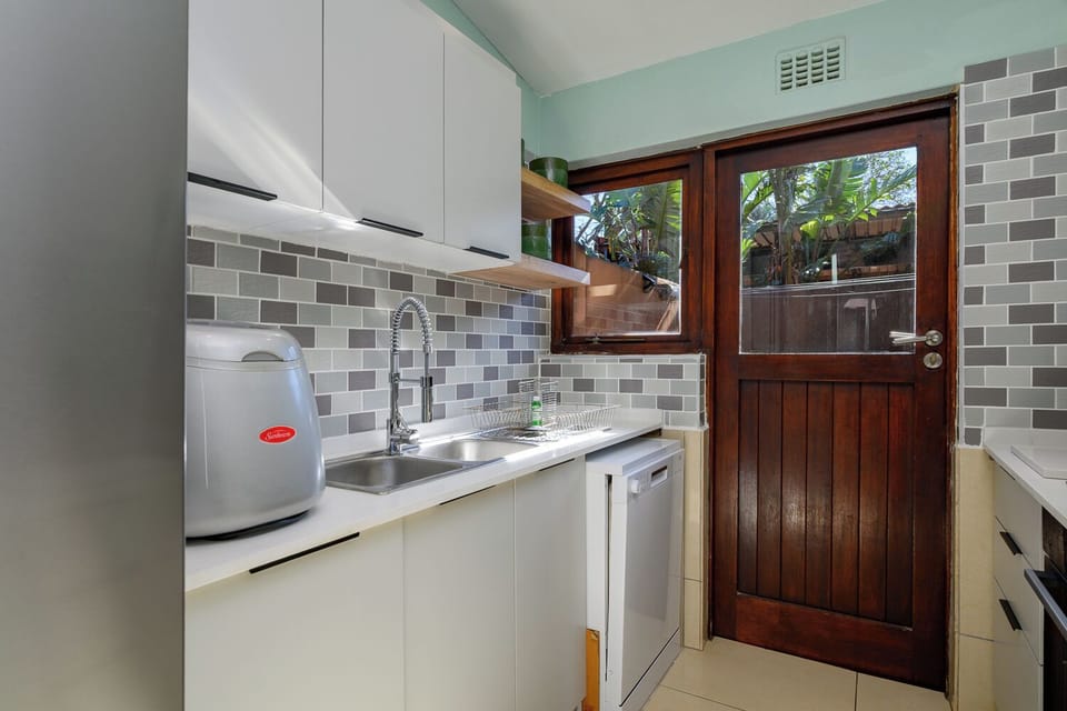 Standard Villa | Private kitchen | Electric kettle, dining tables