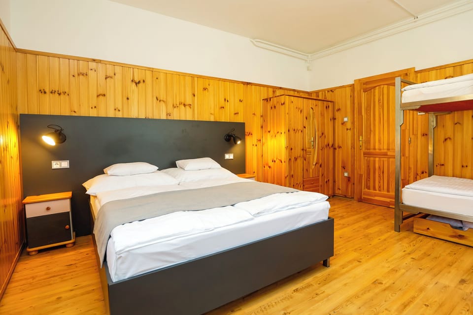 Family Room, Multiple Beds | In-room safe, desk, blackout drapes, iron/ironing board