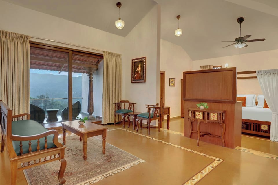 Classic Suite, 1 King Bed, Mountain View | Living room | 32-inch LCD TV with satellite channels, TV