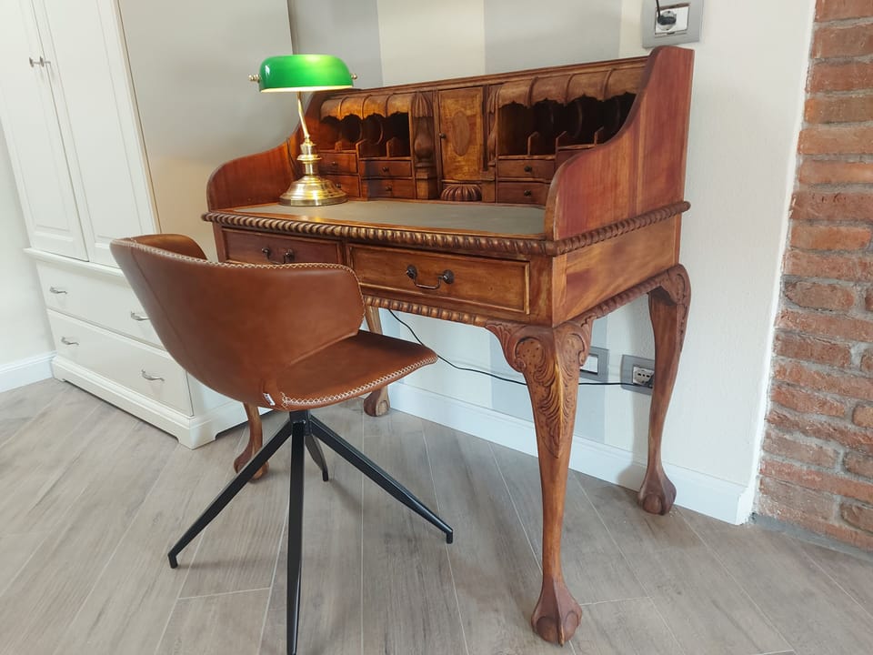 Desk, laptop workspace, free WiFi, bed sheets