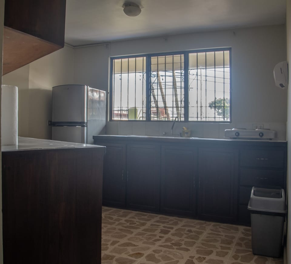 Shared fridge, microwave, coffee/tea maker, dining tables